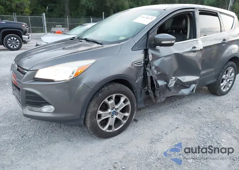 2013 Ford Escape Sel z USA, uszkodzony, nr VIN 1FMCU9H93DUD92992